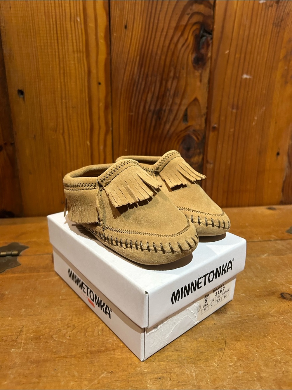 Minnetonka Kids Fringe Moccasins in Tan